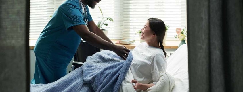 4. Nurses replacing patient room curtains cleaned by M.I.T. Cleaning service