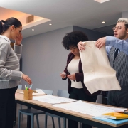Stack of neatly folded white napkins from M.I.T. Cleaning’s same-week service